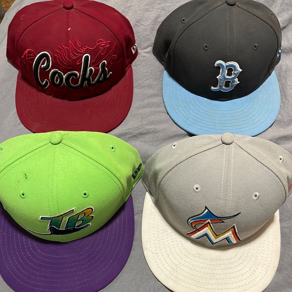 New era fitted flat bill hats. Bruins. Cocks. Rays. Marlins. EUC.
